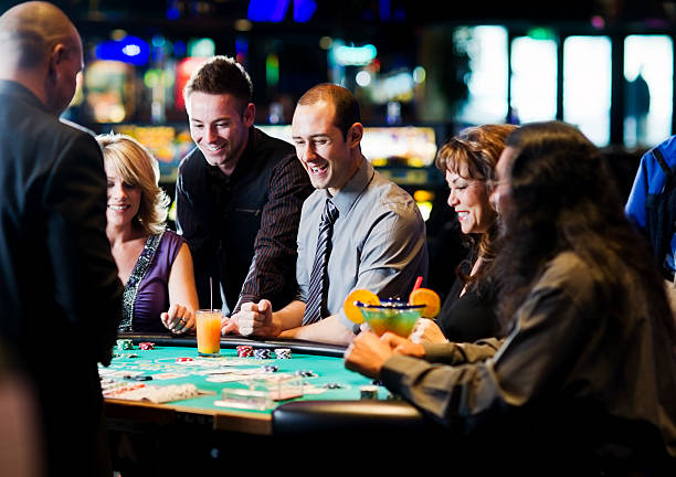 Teen Patti round with cards revealed Teen Patti dealer showing three cards dealt to players